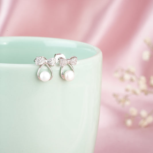 Silver zircon 'Pearly Bow Elegance' earrings with freshwater pearls